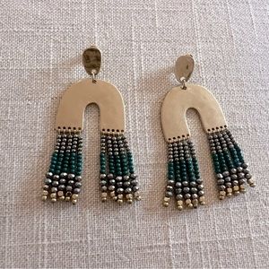 Horseshoe Hammered matte gold with teal beaded. Post back.